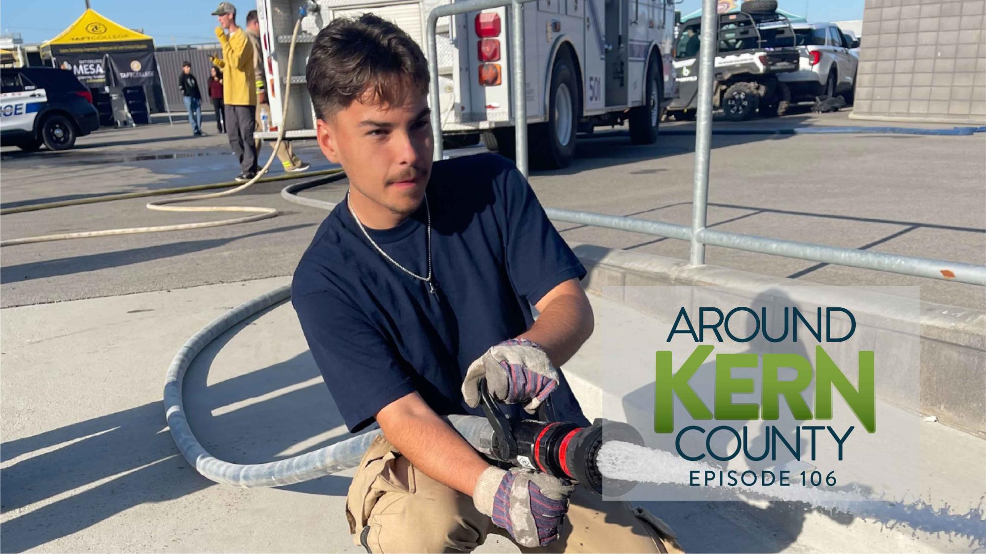 Photo of a student with a firehouse at the Kern County Career and STEM Expo