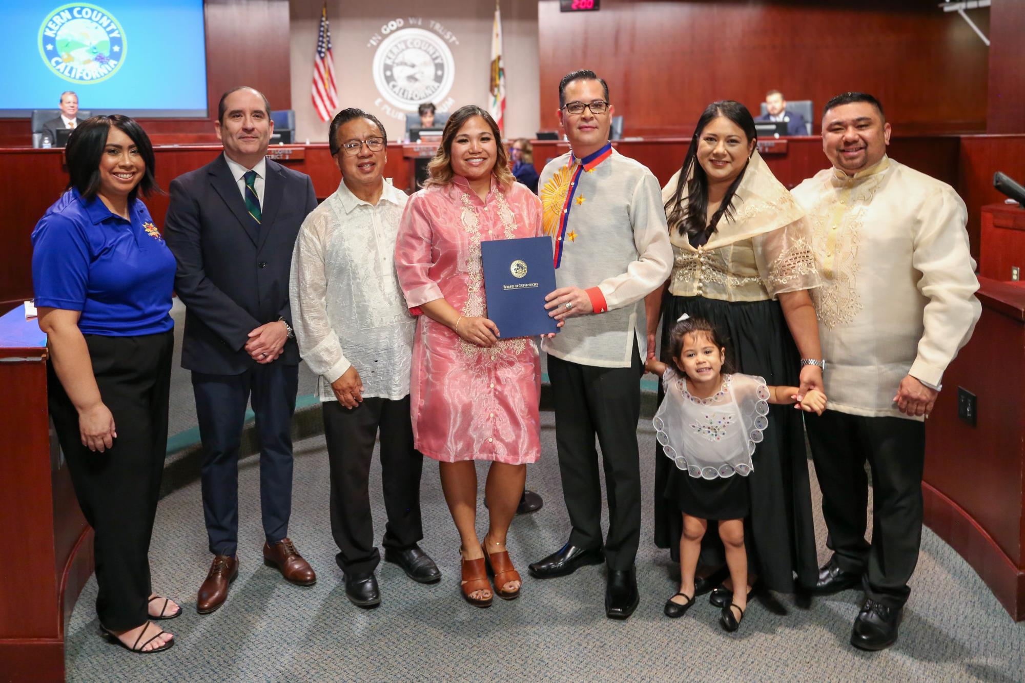 Board Supervisor presenting a proclamation to community representatives for Filipino American History Month in Kern County