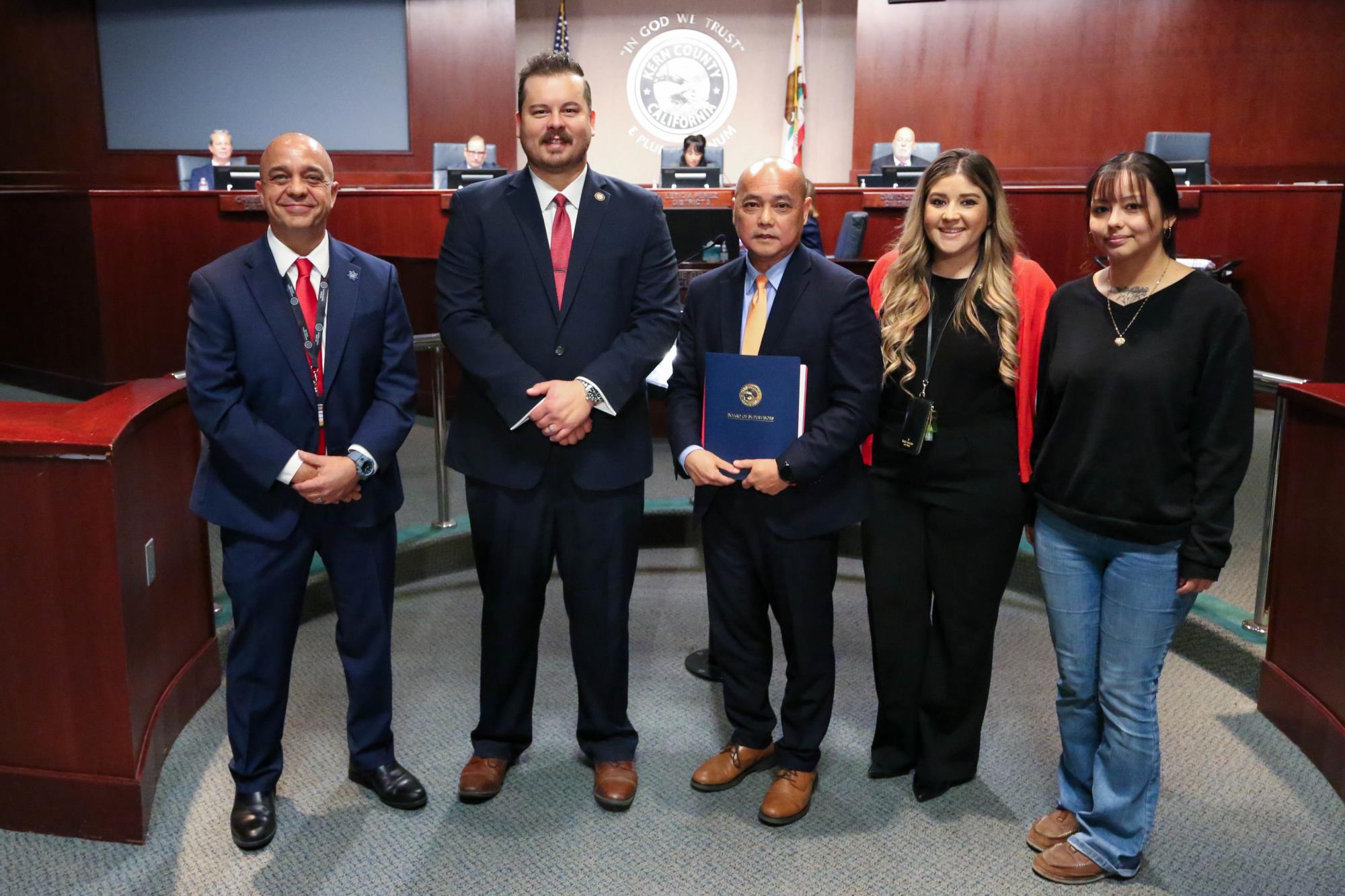 Board of Supervisors Philip Peters presenting a proclamation to the Department of Human Services team at the November 4, 2025 board meeting